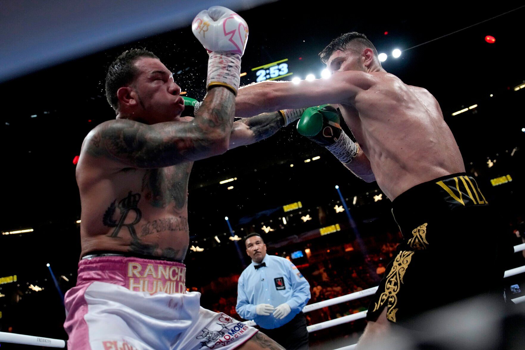 APTOPIX Akhmedov Rosado Boxing